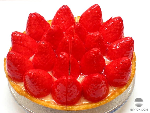 A model of cheesecake with strawberry